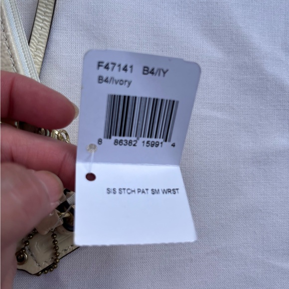 Coach Signature Patch Patent Leather Wristlet - Picture 3 of 11